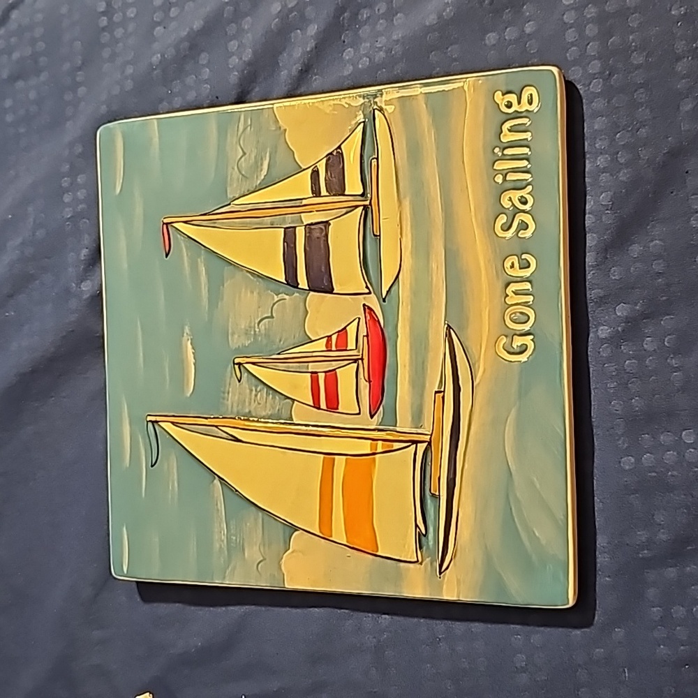 Ceramic Trivet or plaque. Measures 8"×8" has mounting or stand attached.